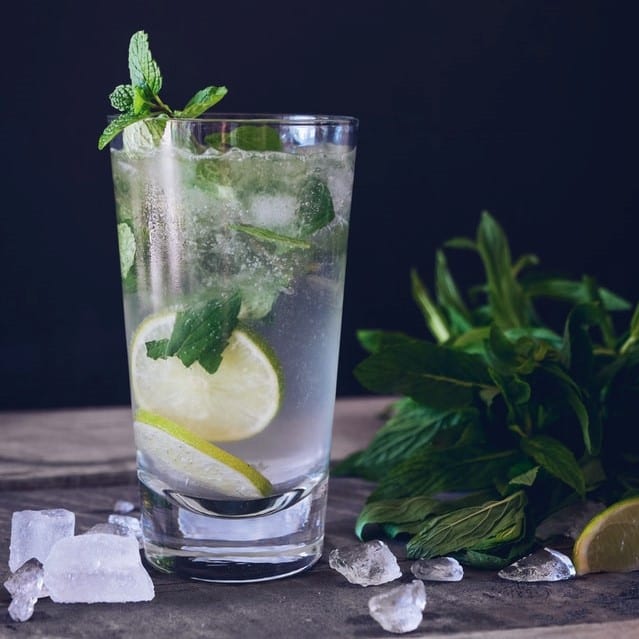 mint in water with lemons